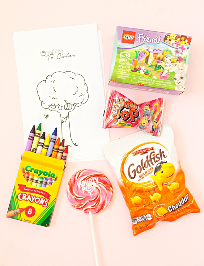 Pack up your gifts. I put the coloring sheets on the bottom and then ...